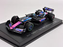 a toy race car on a black stand