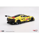 a yellow race car with black and white graphics