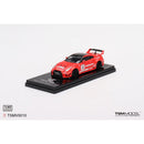 a red toy car on a black stand