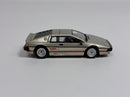 a toy car on a white surface