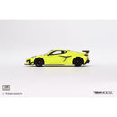 a yellow sports car on a white background