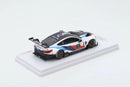 a toy car on a white surface