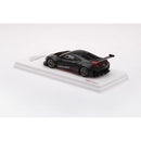 a black sports car on a white surface