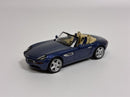 a blue toy car with a convertible top
