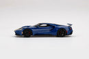 a blue sports car on a white background