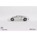 a silver sports car on a white background