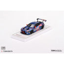 a toy car on a white surface