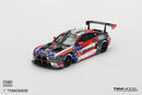 a toy race car with a flag design