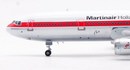 a model airplane with red and white stripes