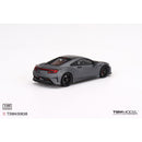 a grey sports car on a white background