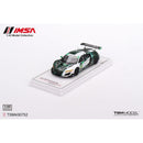 a toy car on a white surface