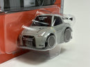 a toy car in a plastic package