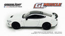 a white toy car with black wheels