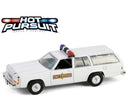 a white toy car with a light on top