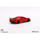 a red toy car on a white background