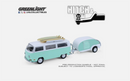 a toy van with surfboards on top