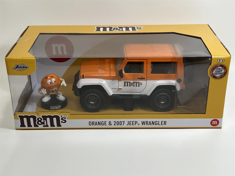 M&Ms Orange Figure and 2007 Jeep Wrangler 1:24 Scale Jada 253255068 34401