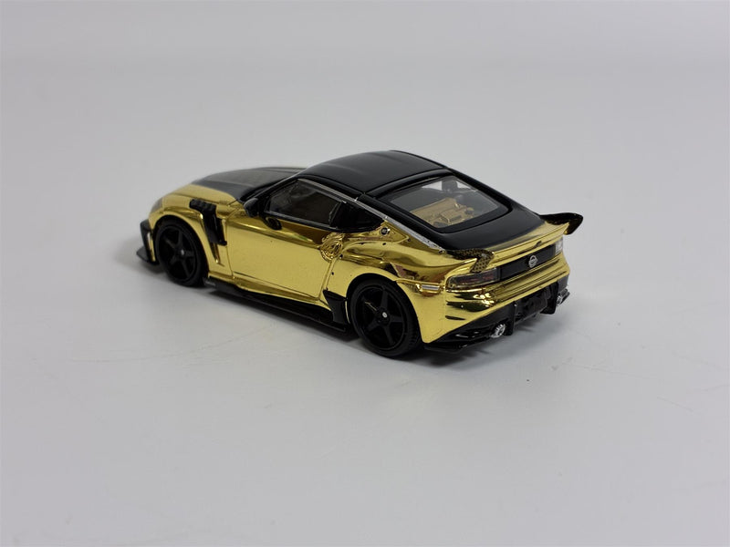 Nissan Z VeilSide FFZ400 Gold Chrome RHD 1:64 Scale Mini GT MGT00985R