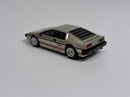 a toy car on a white surface
