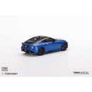 a blue toy car on a white background