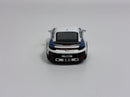 a white toy car with blue stripes