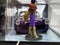 Batgirl Figure and 1957 Chevy Corvette Purple 1:24 Scale Jada 253255007