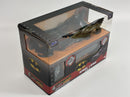a box with a toy bat and batman figure