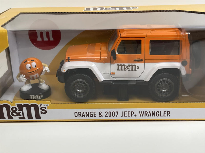 M&Ms Orange Figure and 2007 Jeep Wrangler 1:24 Scale Jada 253255068 34401