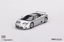a silver toy car on a white background