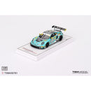 a toy car on a white surface
