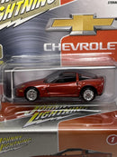 2012 Chevy Corvette Z06 with Tin Inferno Orange 1:64 Scale Johnny Lightning JLCT009B