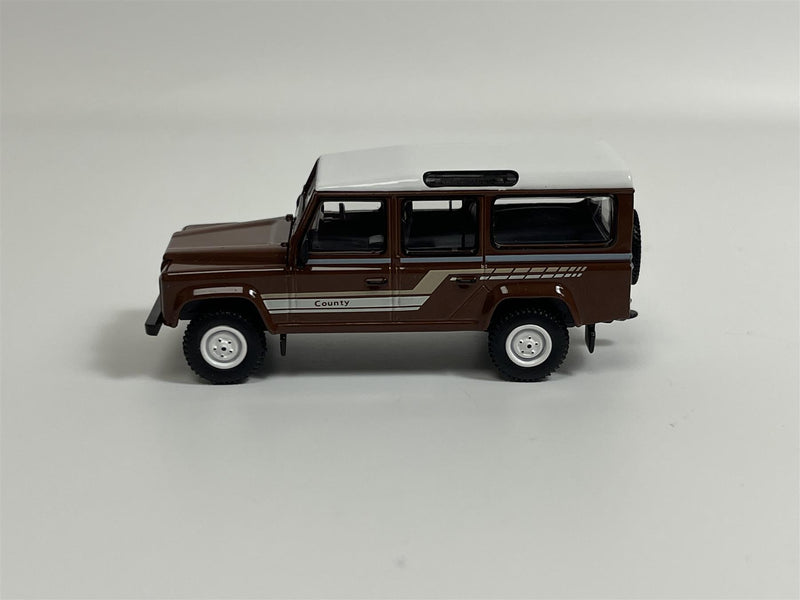 Land Rover Defender 110 1985 County Station Wagon Russet Brown RHD 1:64 Mini GT MGT00734R