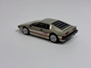 a toy car on a white surface
