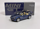 a blue toy car next to a box