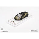 a toy car on a white surface