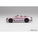 a pink convertible car on a white background