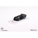 a black toy car on a white surface