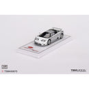 a silver car on a white surface