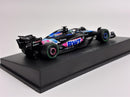 a toy race car on a black stand