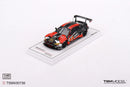 a toy car on a white surface