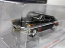 a black toy car in a plastic case