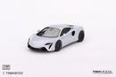 a white toy car on a white background