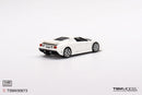 a white toy car on a white background