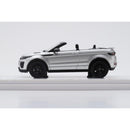a silver car on a white surface