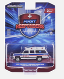 a toy ambulance in a package