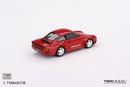 a red toy car on a white background
