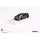 a toy car on a white surface