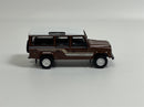 Land Rover Defender 110 1985 County Station Wagon Russet Brown LHD 1:64 Mini GT MGT00734L