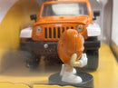 M&Ms Orange Figure and 2007 Jeep Wrangler 1:24 Scale Jada 253255068 34401