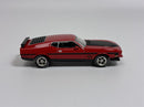 a red toy car on a white background